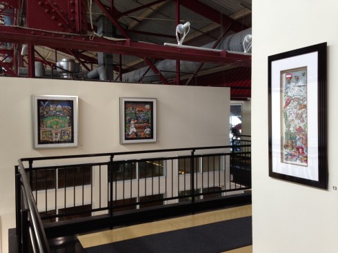 Photo of one of the hallways at Chelsea Piers where Fazzino sports artwork is framed and hanging on the walls