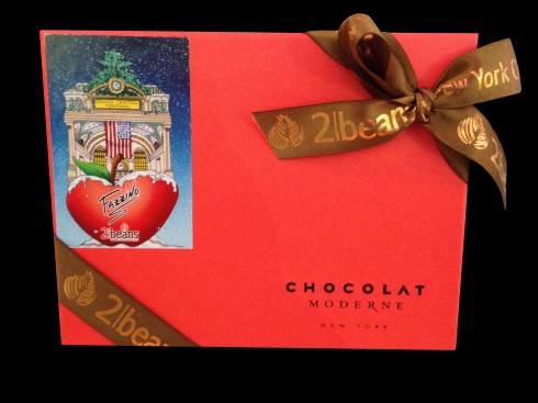 Image of the top of the 2|Beans, Fazzino style box of chocolate, with a red cover and an image of Fazzino pop art