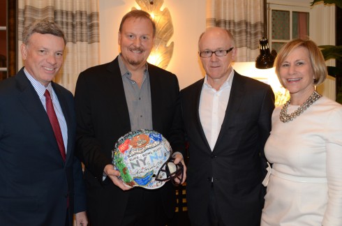 Fazzino posing for a picture with Al Kelly, Woody Johnson, and Laura Tisch at the Super Bowl artwork reveal at the Holiday House in NYC