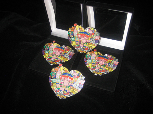 Image of 4 of Fazzino's broadway themed pins int he shape of a heart