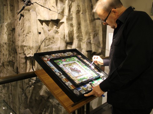 Charles Fazzino signing his New York Edition of Monopoly at the Museum of Natural History