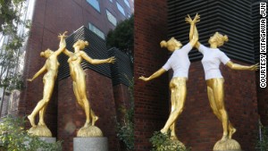 Image of elegant gold female statues tagged with Jun Kitagawa's white t-shirts