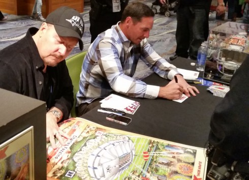 Charles Fazzino and Jay Feely sign autographs at the NFL Shop