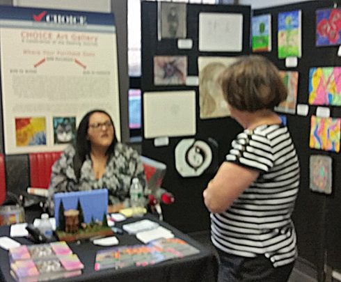 The CHOICE of NY table at Arts Fest featuring artwork by locals who have received mental health services