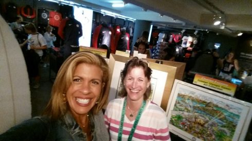 NBC News Anchor and TV personnel, Hoda Kotb, and Julie Maner in front of Charles Fazzino's 2016 Olympic Game pop art collection at the 2016 Summer Olympic Games in Rio.