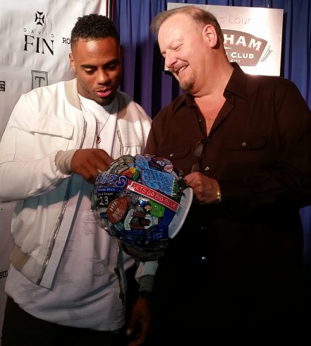 Fazzino presents Rashad Jennings with a custom made helmet