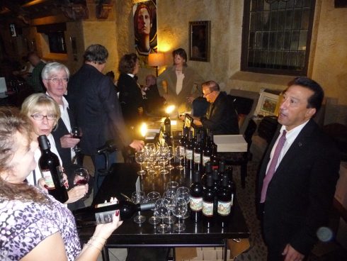 Charles Fazzino signing bottles at the Winery at St. George Napa Valley Blend Release Party