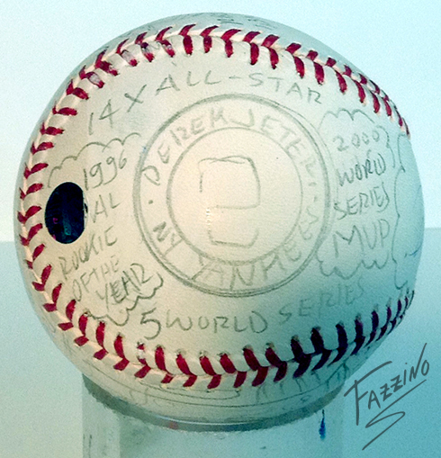 Writing with pencil on a baseball to create art