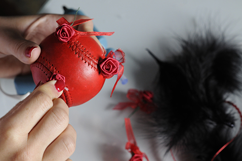 Roses and black feathers on a Valentine's Day inspired baseball art