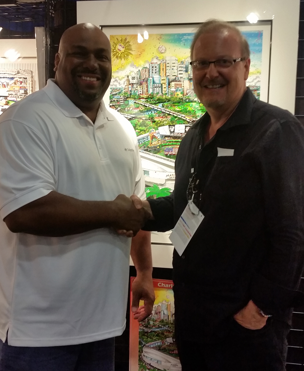 Charles Fazzino shaking hands with Bobby Bonilla at MLB All-Star Fan Fest 2017