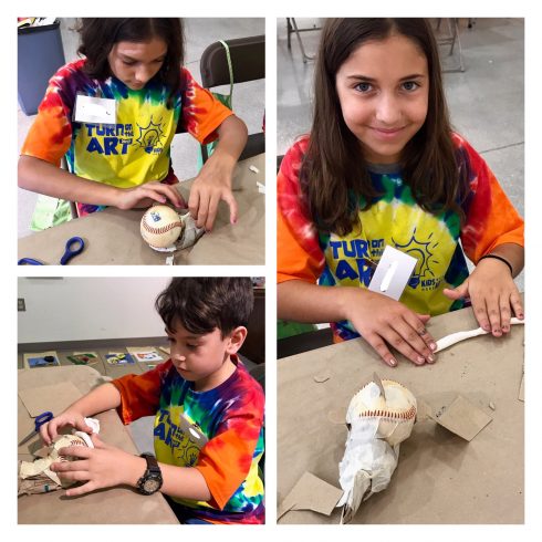 Kids Need More Art at Pine Jog Environmental Science create Pufferfish out of recycled baseballs