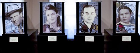 Four portraits of heroes of the Holocaust framed at HMTC