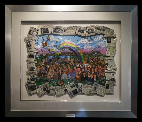 Multi-medium peice of art that encompasses past heroes of the holocaust with a newspaper frame at HMTC