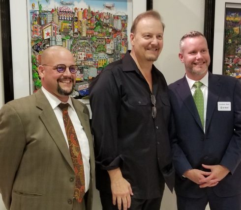 Charles Fazzino pictured in front of his 3D works at the opening of "The 3D World of Fazzino" at the MAC Gallery in New Rochelle