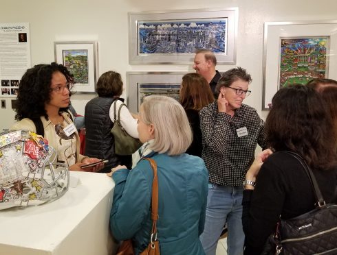People conversating at the opening reception of "The 3D World of Fazzino" at the MAC Gallery in New Rochelle