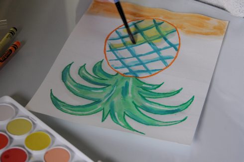 Working additional layers over on the pineapple painting with watercolors