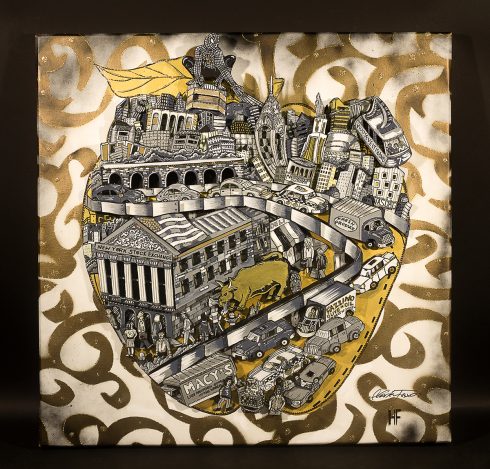 A black and grey city skyline inside of a golden apple - Golden Apple Collaboration  done by Charles and Heather Fazzino