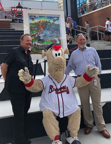 Charles Fazzino, Michael Plant, and Blooper posing in front of the Atlanta Braves pop art piece 