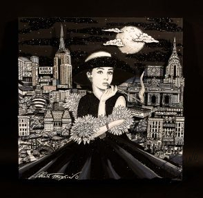Audrey Hepburn, in a black and white painting, in front of a city