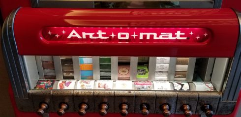Close up of the Art-O-Mat machine and the art works that live within in the dispensing machine