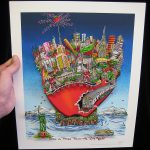 hand holding an pop art print of the new york city skyline in the shape of a red apple and a nyc subway train going through it like a worm, floating on an island next to the statue of liberty- 3D Pop Artist Charles Fazzino