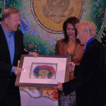 Charles Fazzino presents artwork to Elie Weisel as Giselle Fernandez looks on at The Jefferson Awards ceremony