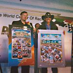 Charles Fazzino appears with racing legend Richard Petty to unveil his artwork for the Daytona 500