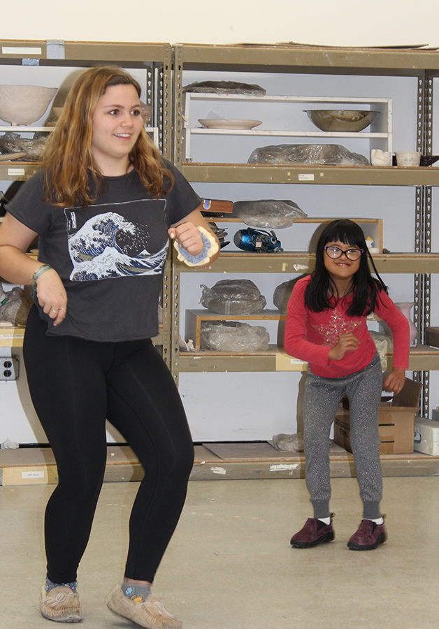 2021 Fazzino Award of Heart winner Molly dancing with a young girl