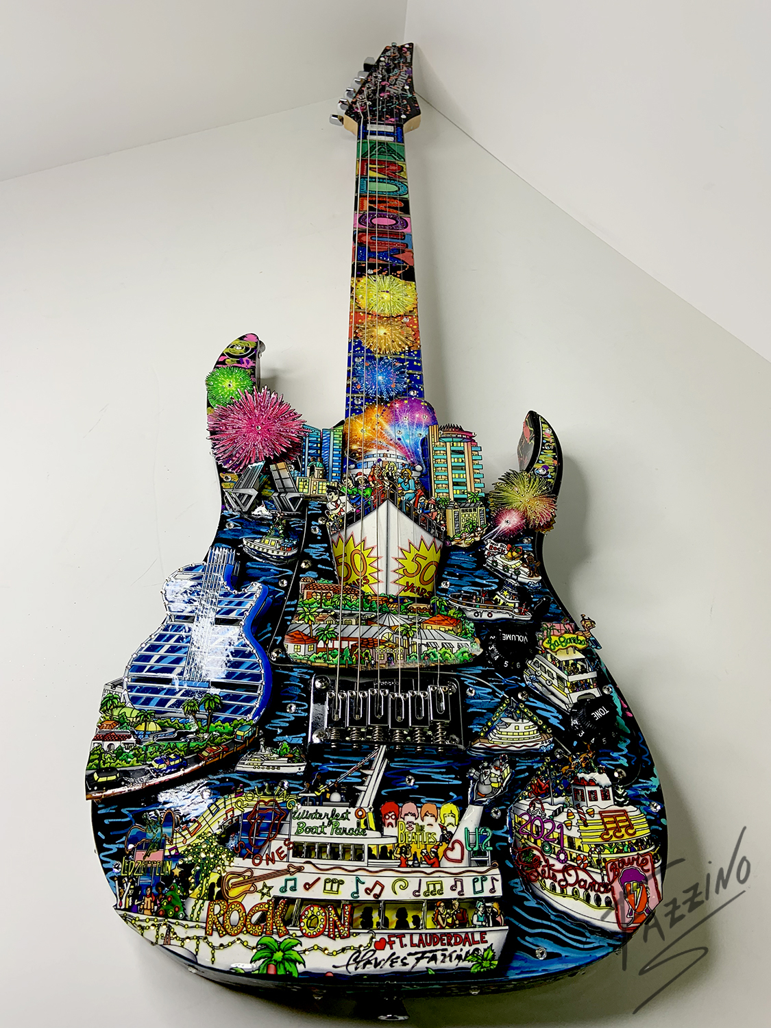 Charles Fazzino hand-painted, original rock guitar to commemorate Winterfest's 50th Anniversary