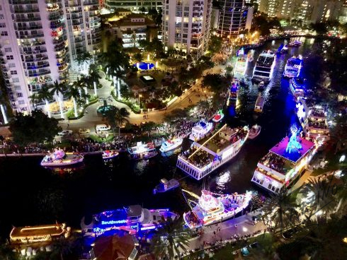 Aerial view of the 50th Anniversary of the Winterfest Boat Parade at night | Charles Fazzino