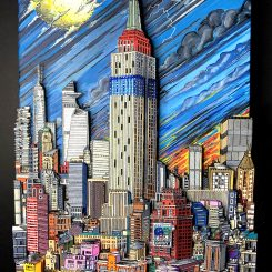 tall skyscraper surrounded by smaller buildings with a large yellow moon and blue and gray stormy sky