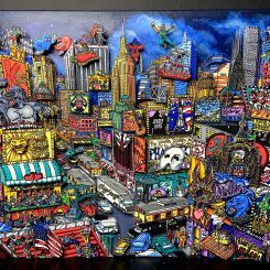 Art piece of Broadway, featuring a collage of buildings, signs of Broadway shows like the Lion King and Phantom of the Opera, and characters like Spiderman and Aladdin