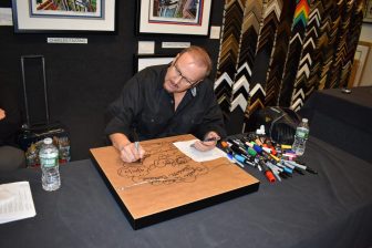 Charles Fazzino working on an art piece in Long Island, NY.