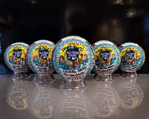 5 hand painted baseballs in a v shape for the 2023 All-Star game
