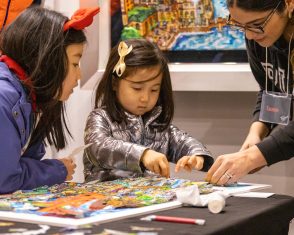 A few children working on art projects in the Fazzino studio during ArtsFest