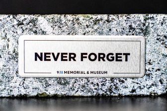 "Never Forget" granite keepsake from the 9/11 Memorial & Museum, carved from granite used to build the Memorial plaza